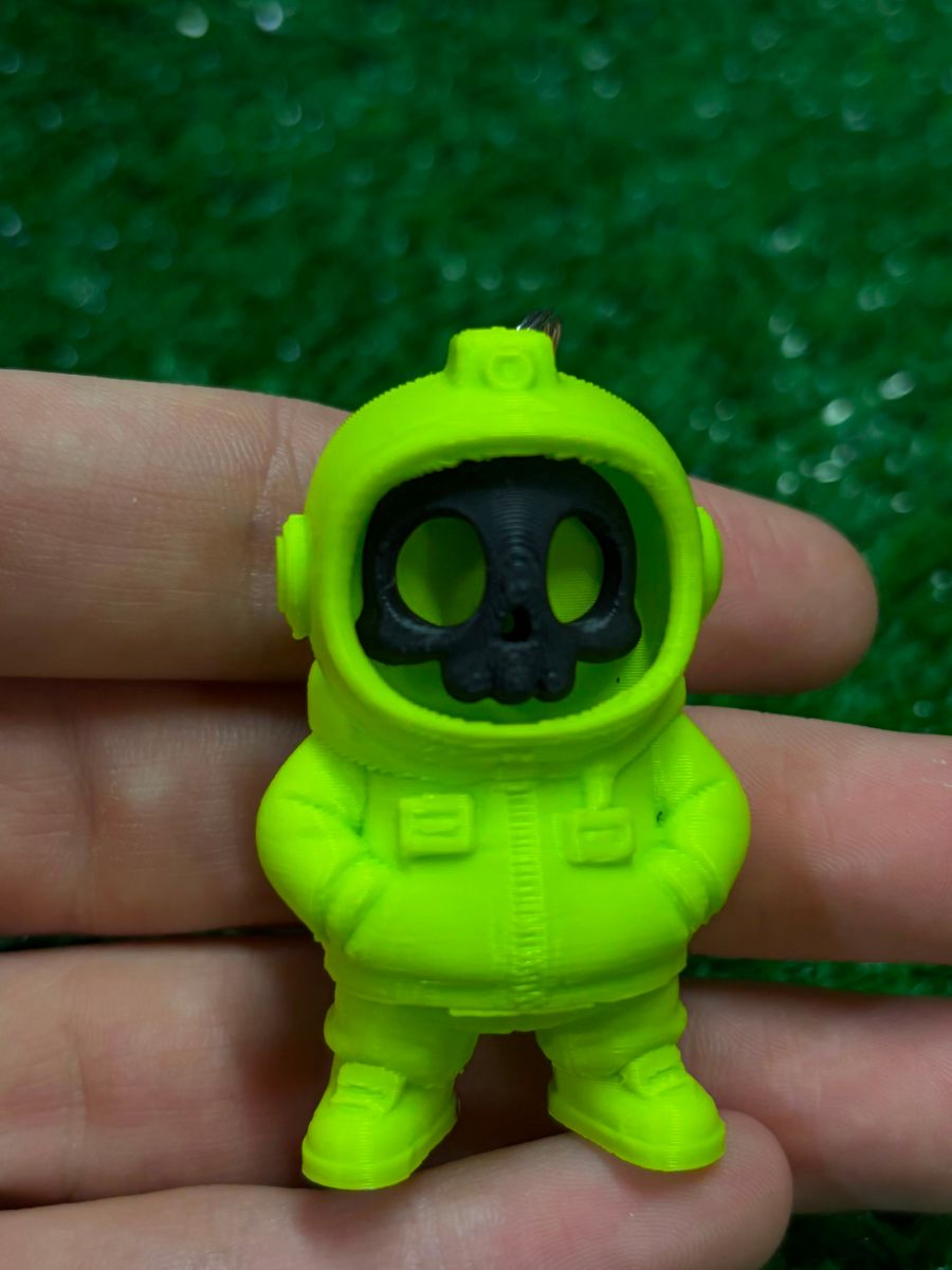 Chaveiro caveira astronauta